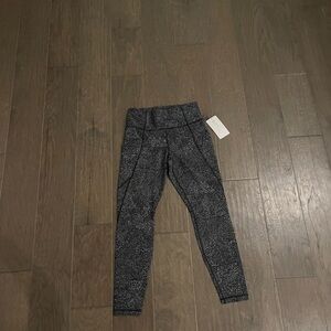 Athleta Salutation Stash Pocket Tight Leggings
